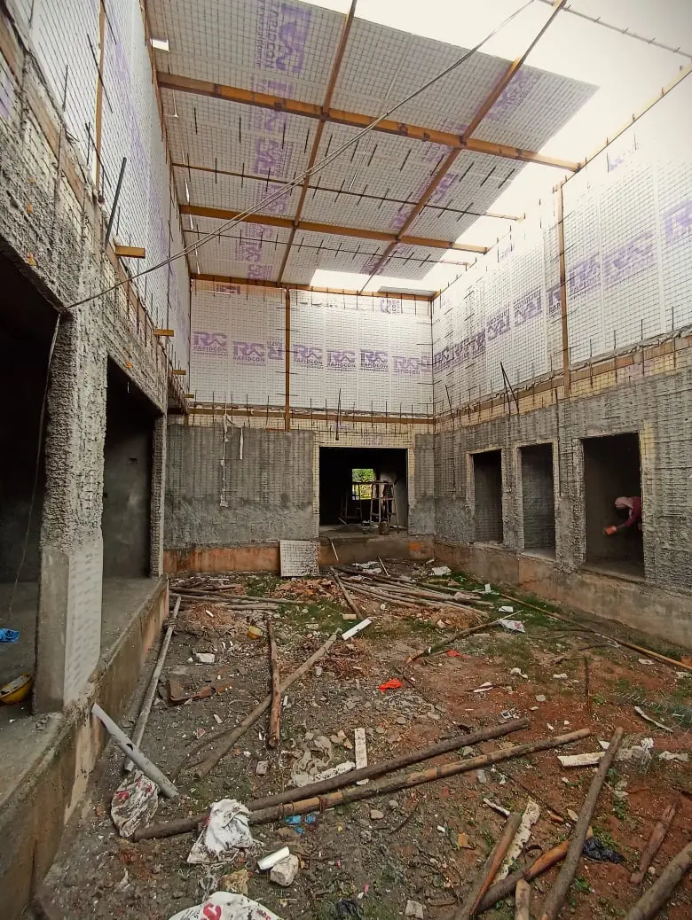 Connecting 3D wire mesh EPS panels to form a continuous, earthquake-resistant structural wall.